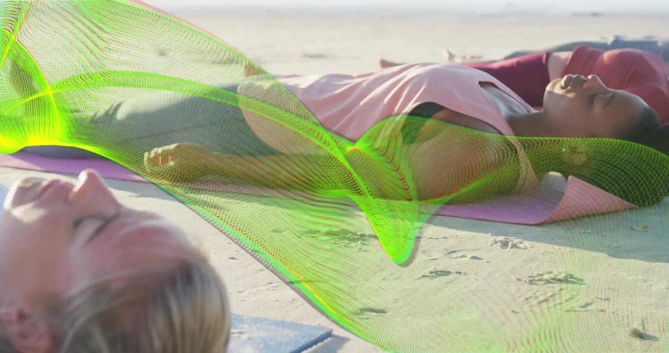 Braided woman lying on pink mat beach, green ribbon sweeping, camera panning, practicing breathwork
