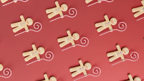 Gingerbread-Men-and-Candy-Canes-on-a-red-background