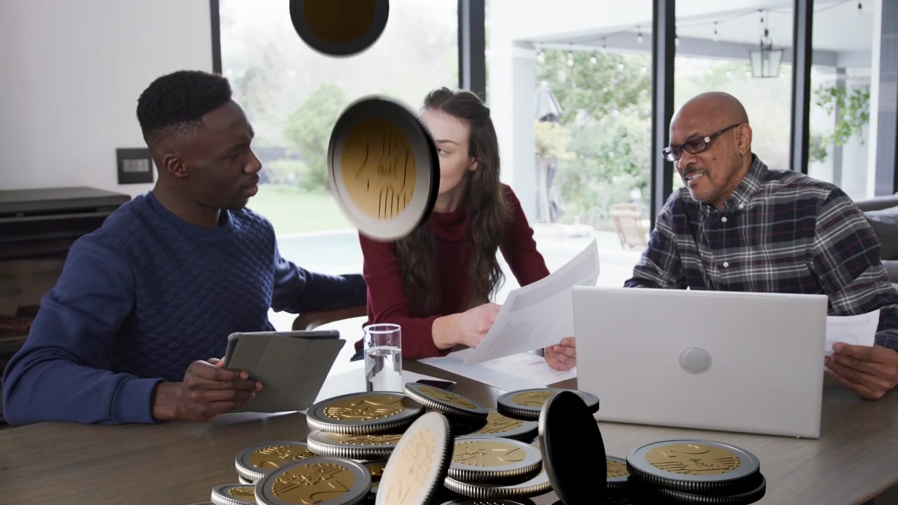 Family group reviewing finances, animation starting releasing coins onto table while group watching