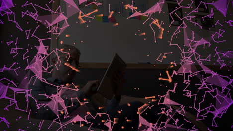 mid-adult man interacting with tablet in office lounge, displaying glowing digital technology nodes