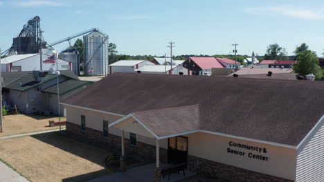 Daytime-Aerial-Ascend-over-a-Senior-Care-Center-in-Rural-America