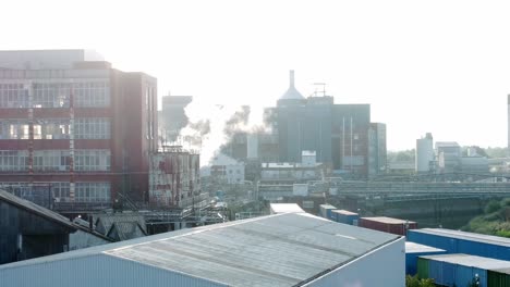 industrial factory complex with smoke stack