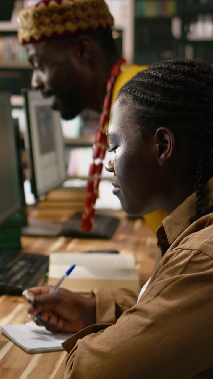 Vertical Video Black Student Working With Ai Brain Display On Desktop Computer In Library