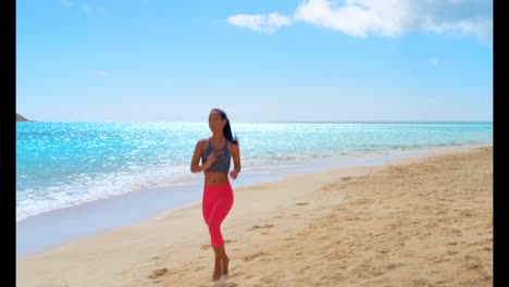 woman jogging in the beach 4k