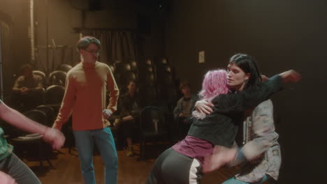 actors improvising on drama class in theater