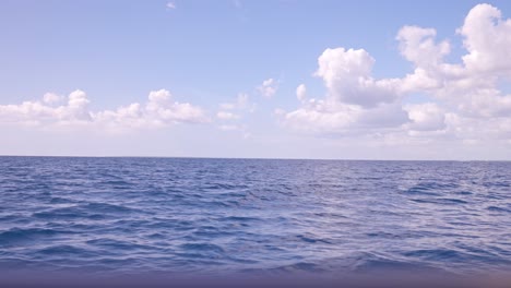 View-of-the-ocean-from-the-window-of-a-yacht-heading-to-New-Florida