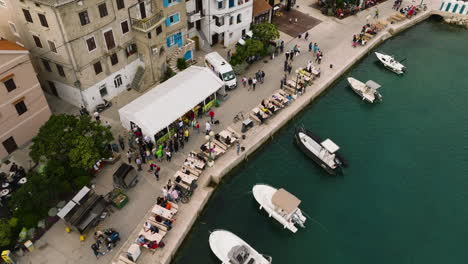 aerial drone view of harbour in baska old town, krk island, kvarner bay, croatia