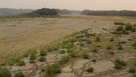 Dry-lake-bed-during-drought-Lake-bed-of-Orlando-Buttes-Lake-in-aerial-hover-4k