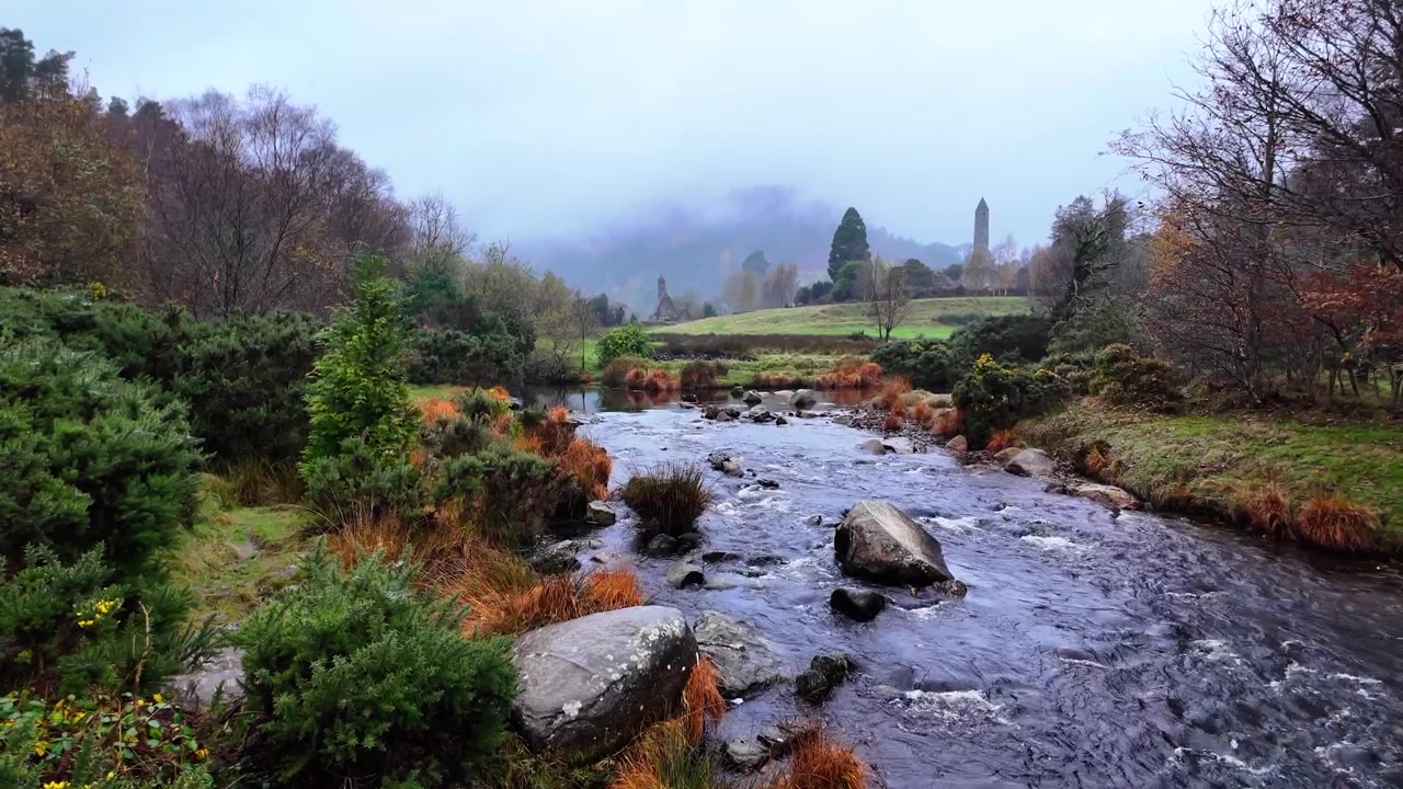 Ireland Epic Locations dreamy winter landscape river and round tower Glendalough Wicklow Mountains Ireland mystical land