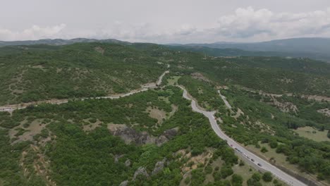 High-angle-drone-view-of-Greek-mountain-pass-in-countryside,-Thessaly,-Greece