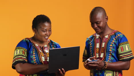 African-american-wife-doing-online-shopping-on-laptop