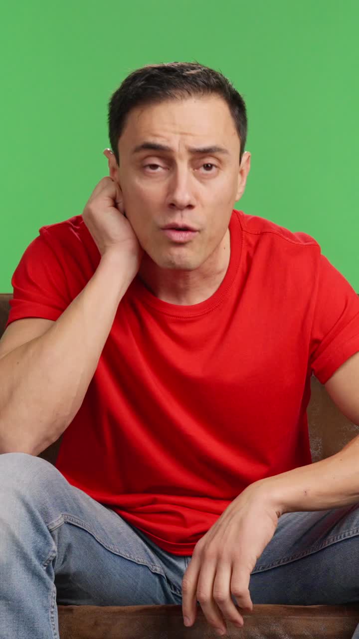 Excited sports fan celebrating goal on green screen