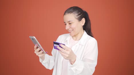 woman shopping with credit card.
