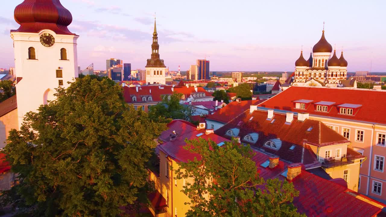 Sunrise drone flight over historic Old Town Tallinn in Vanalinn Estonia