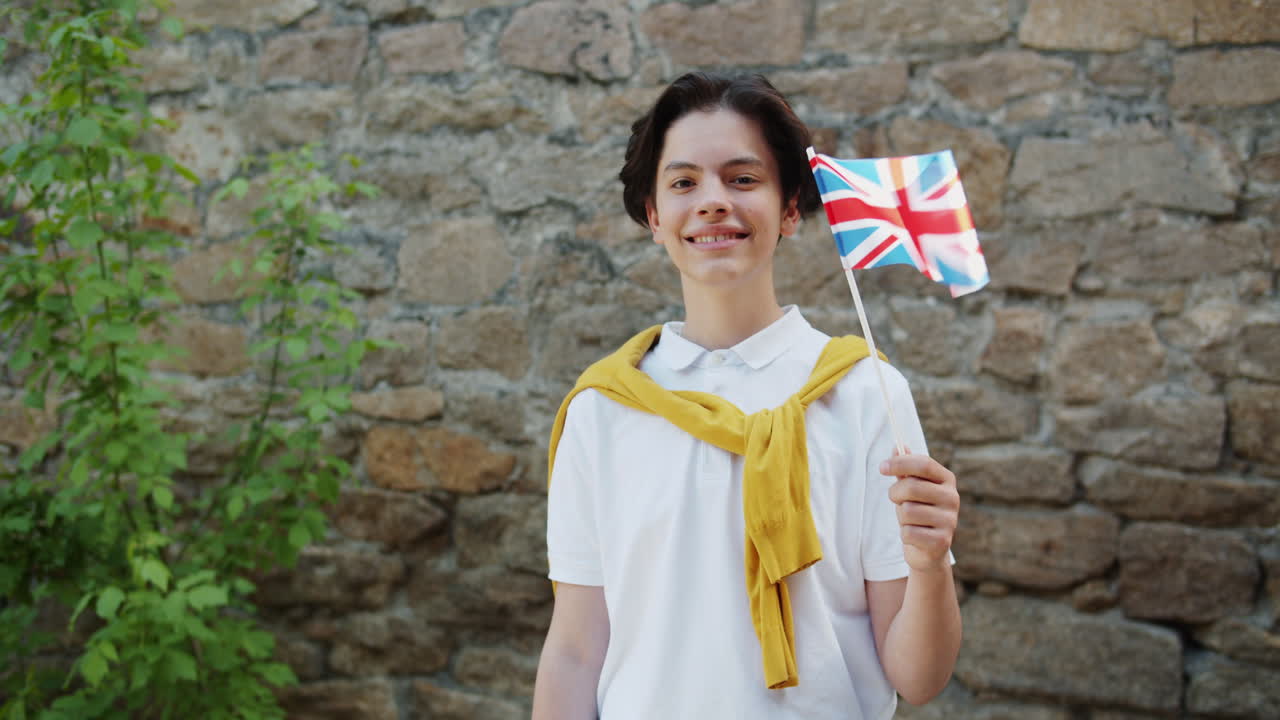 Teenager Holding British Flag