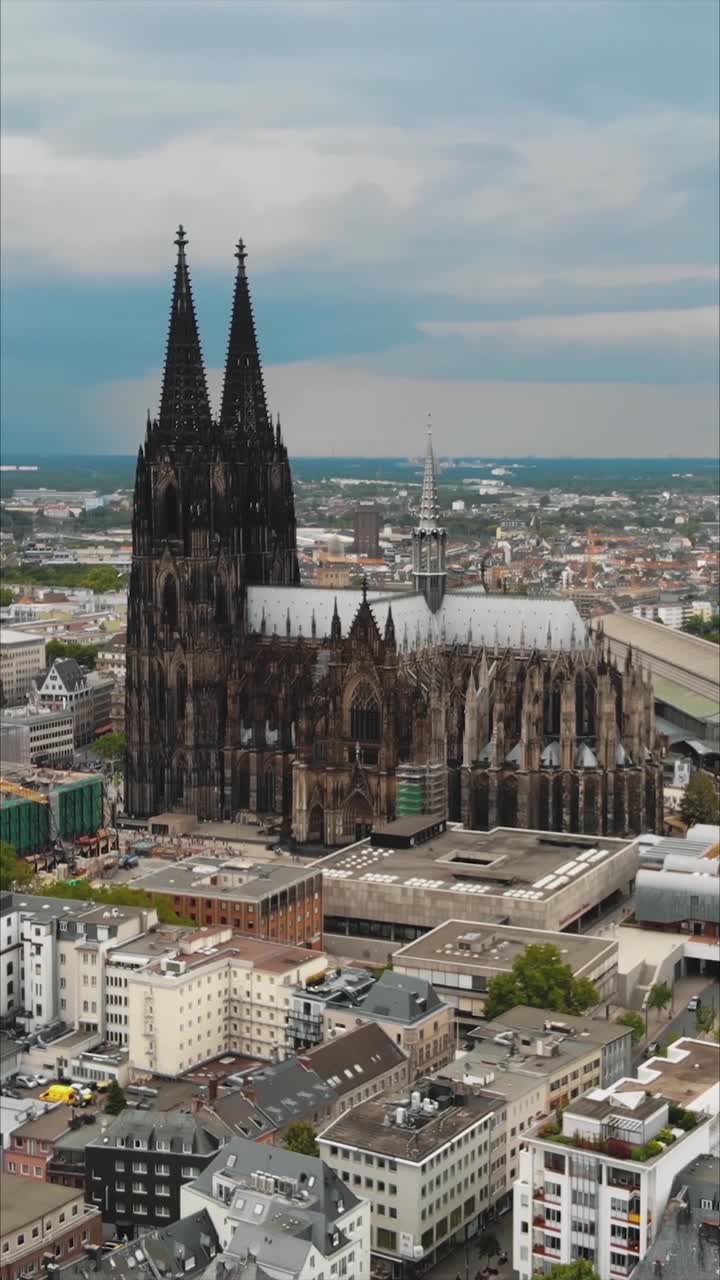Drone vertical shot of Cologne Cathedral and surrounding city in Germany