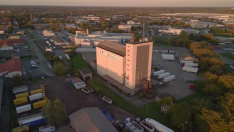 beautiful aerial view flight speed ramp hyperlapse motionlapse timelapse
of a old abandon factory in brandenburg gdr east germany at summer golden hour 2022