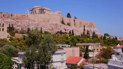 the acropolis and parthenon on the hilltop in athens greece