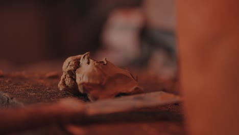 artisan's clay detail: piece of clay on workshop table