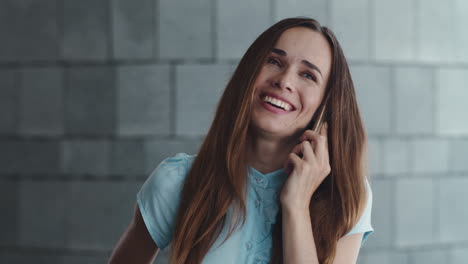 female worker talking on smartphone