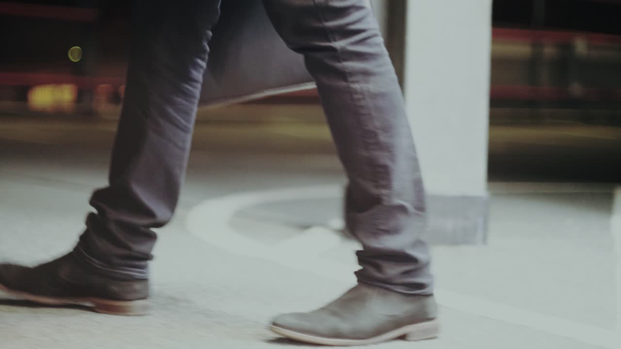 Businessman is walking on multi-storey car park after his work - 1