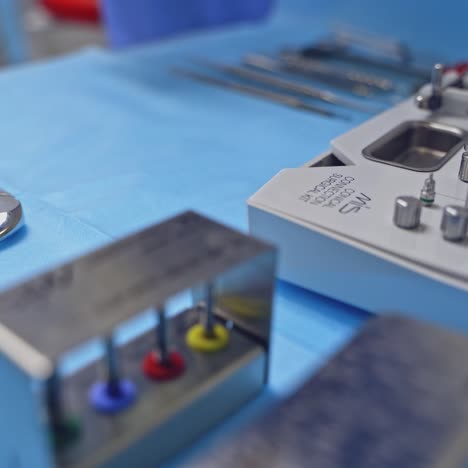 modern professional equipment in dentistry. preparing to work. medical tools for teeth treatment on the table. dentistry concept.