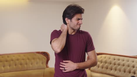 Indian-man-having-severe-neck-pain