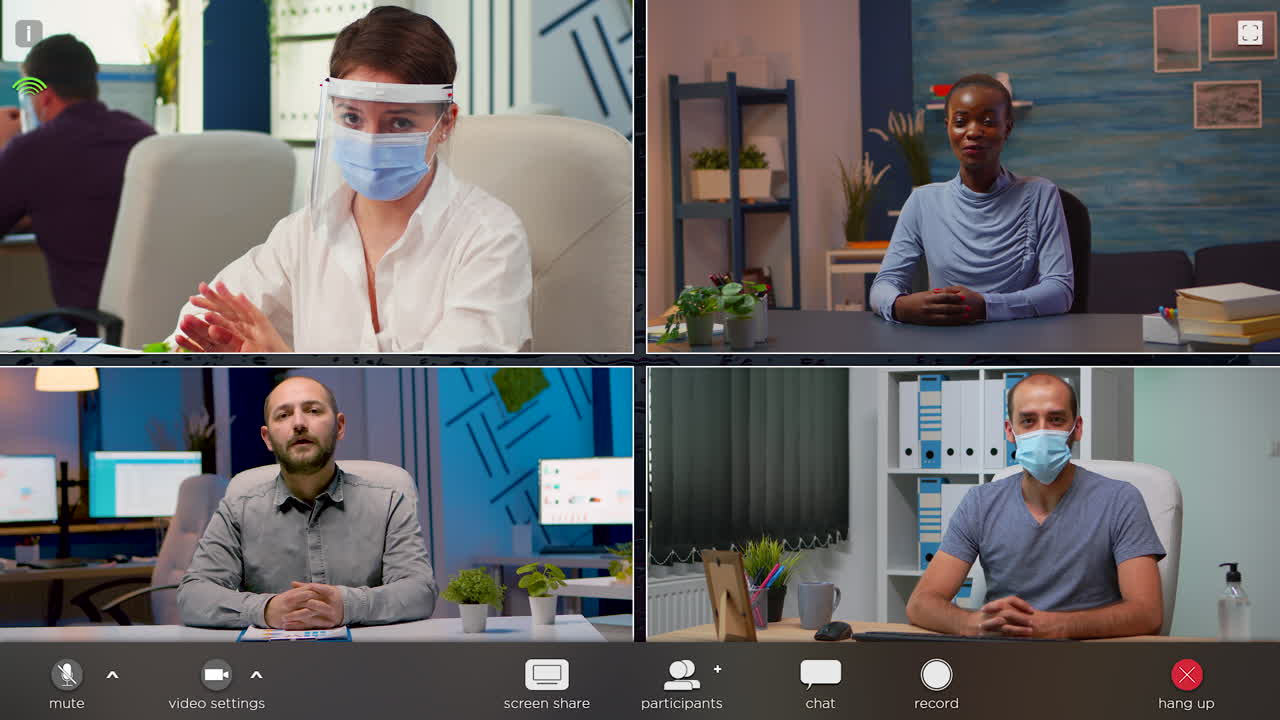 Business people talking in front of camera during virtual meeting