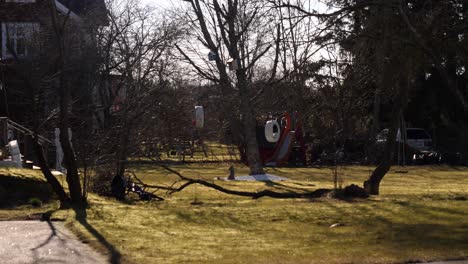 backyard playground from a peeking perspective showing depth and distance