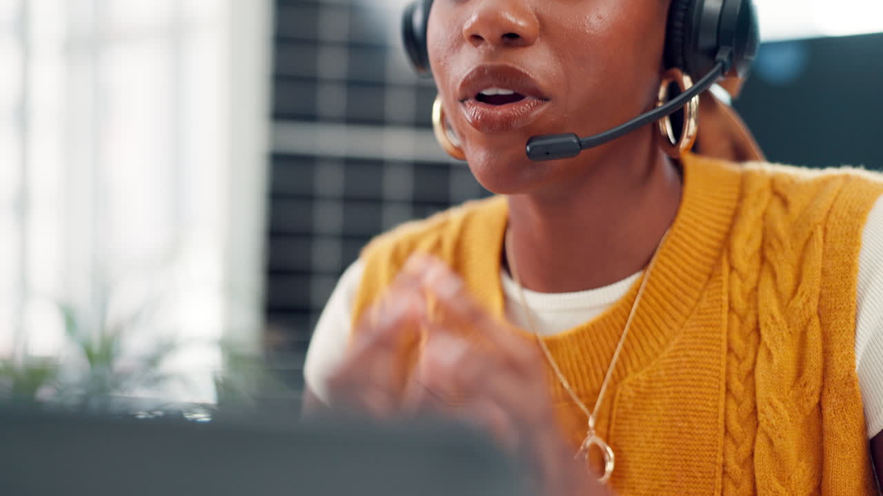 Professional Black Woman Speaking on Headset During Video Call