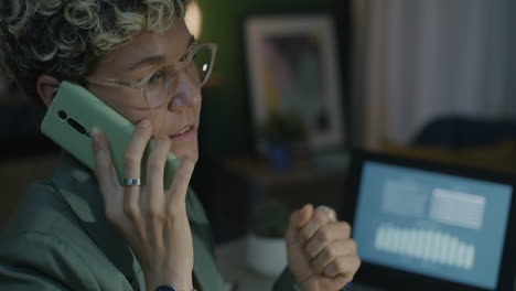 woman on phone call in home office