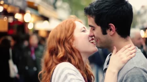 a joyful moment between a couple in love, captured in a vibrant street setting, highlighting their connection and happiness amidst a bustling background