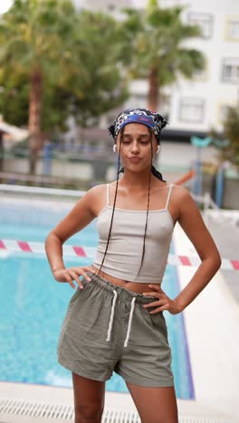 stylish woman by the pool