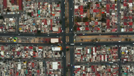 bird's eye automobiles moving in suburban street in mexico city