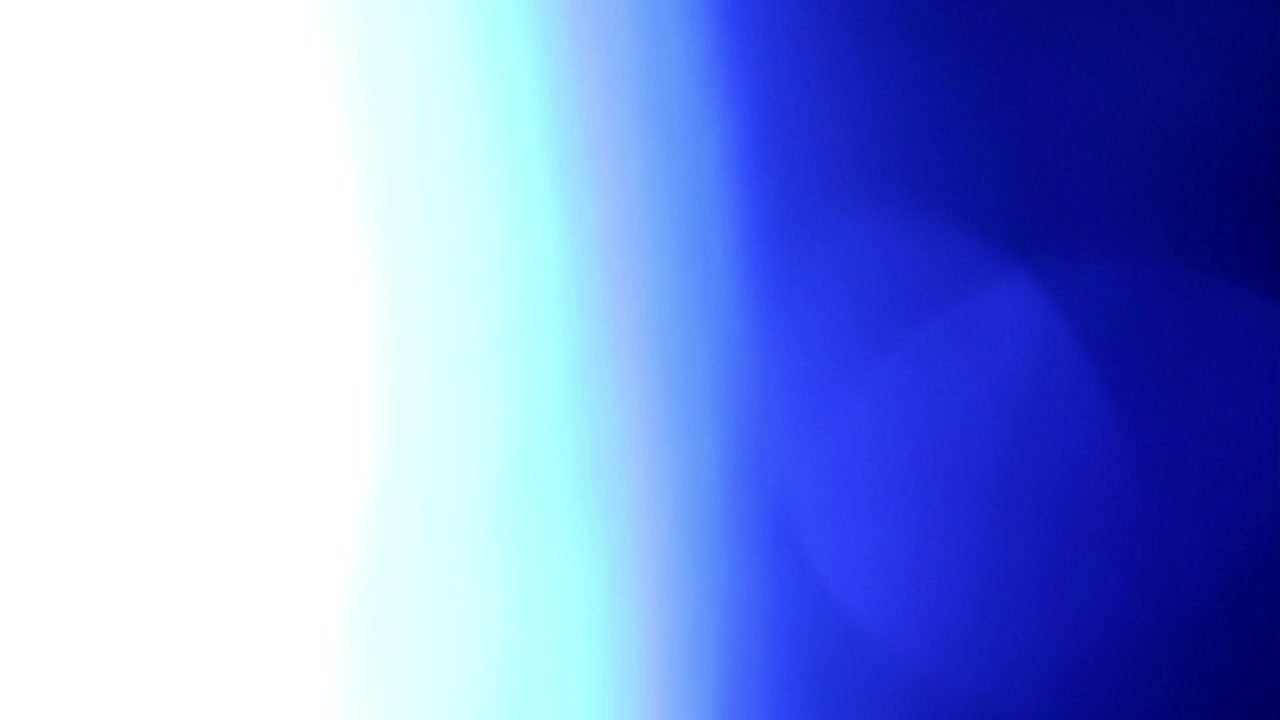 Abstract Blue Light Leak Transition with Lens Flare Effect