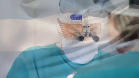 animation of waving argentina flag over caucasian male surgeon performing surgery at hospital