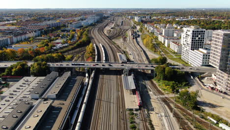 aerial drone shot over railways and two trains running in opposite directions