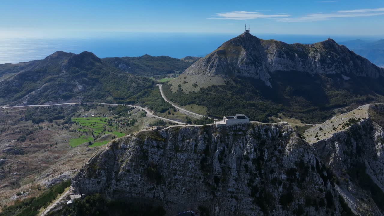 Pan right aerial of Lovćen National Park mountains, Njegoš, Mausoleum and viewpoint in Montenegro