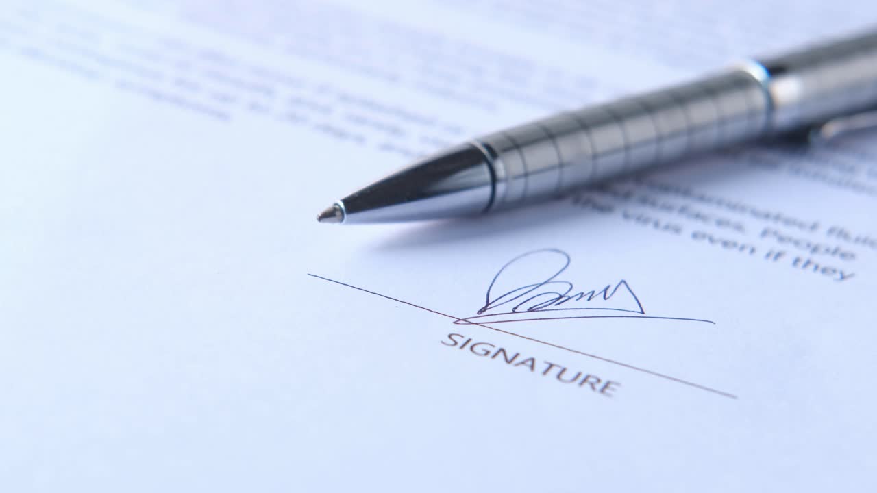 Signed Document with Pen