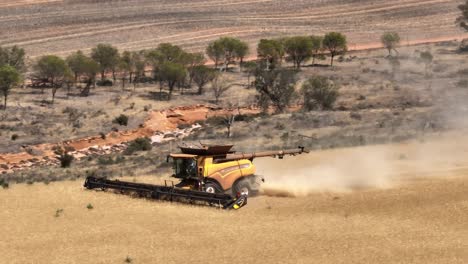 This-footage-captures-the-synergy-of-modern-agricultural-technology,-showcasing-the-essential-role-of-header-fronts-in-the-wheat-harvesting-process