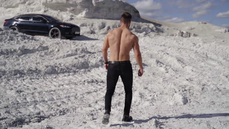 handsome shirtless muscular young man. athletic inflated muscular man with nude torso
