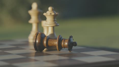 black queen falls captured by whites, chess game