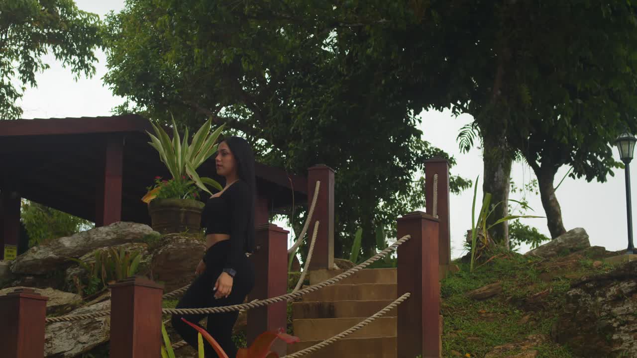 She is immersed in the quiet majesty of the scenic La Vigie setting