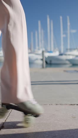 person roller skating by the marina