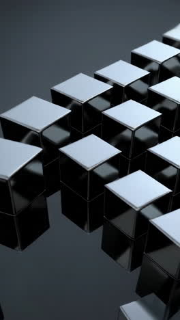 abstract geometric pattern of black and silver cubes