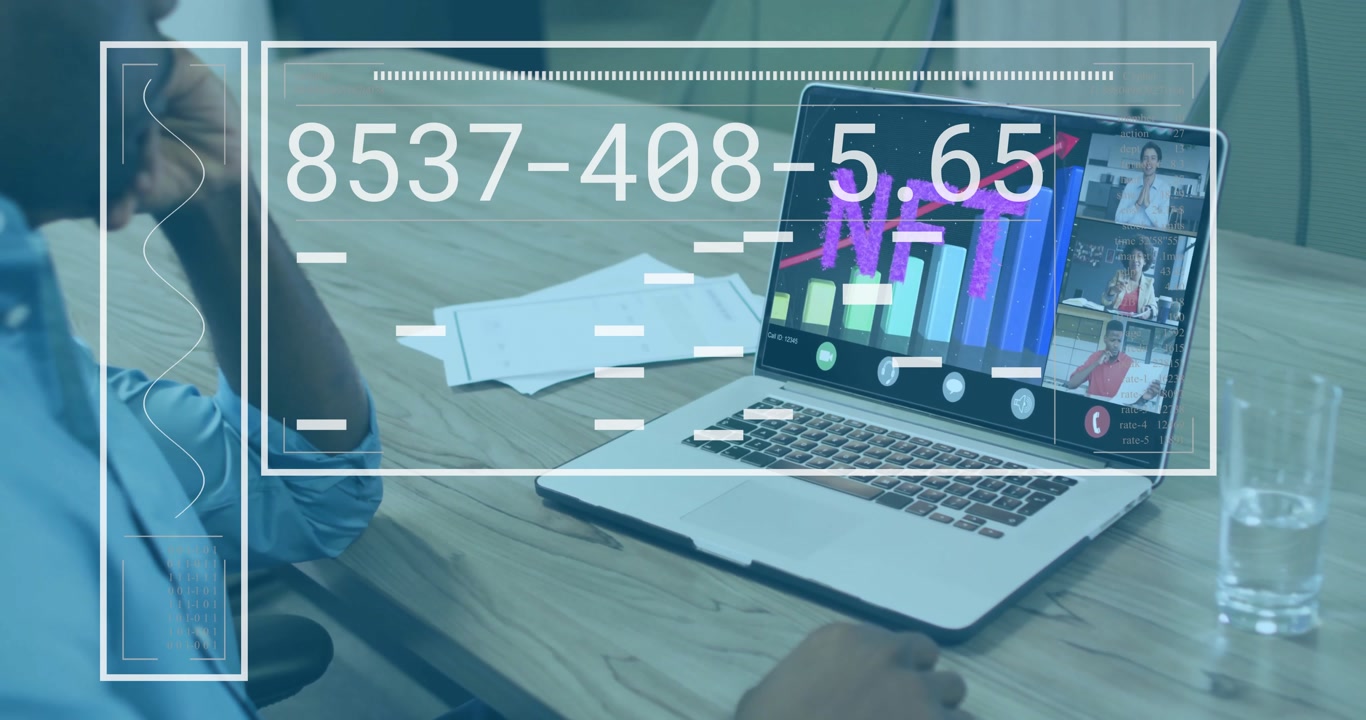Executive starting finance call on laptop while updating code overlay and monitoring NFT chart