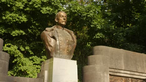 closeup view of bust monument at la cambre abbey on a sunny day in brussels, belgium