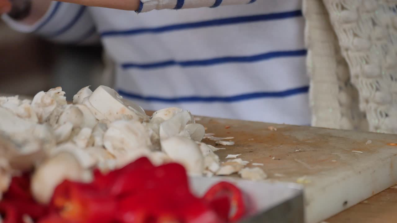 Chopping Mushrooms and Red Peppers