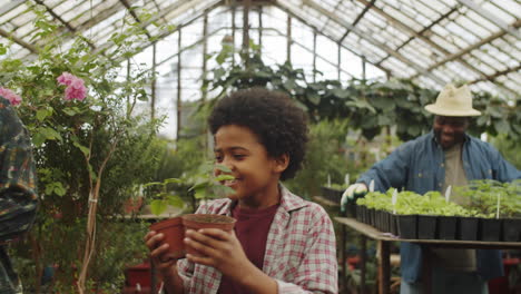 African-American-Boy-Helping-Family-in-Greenhouse