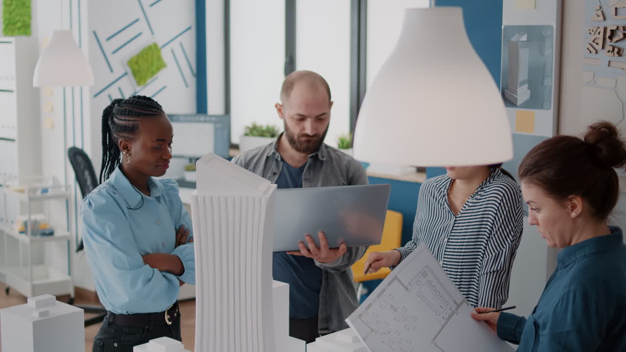 Team Collaborating on Architectural Model